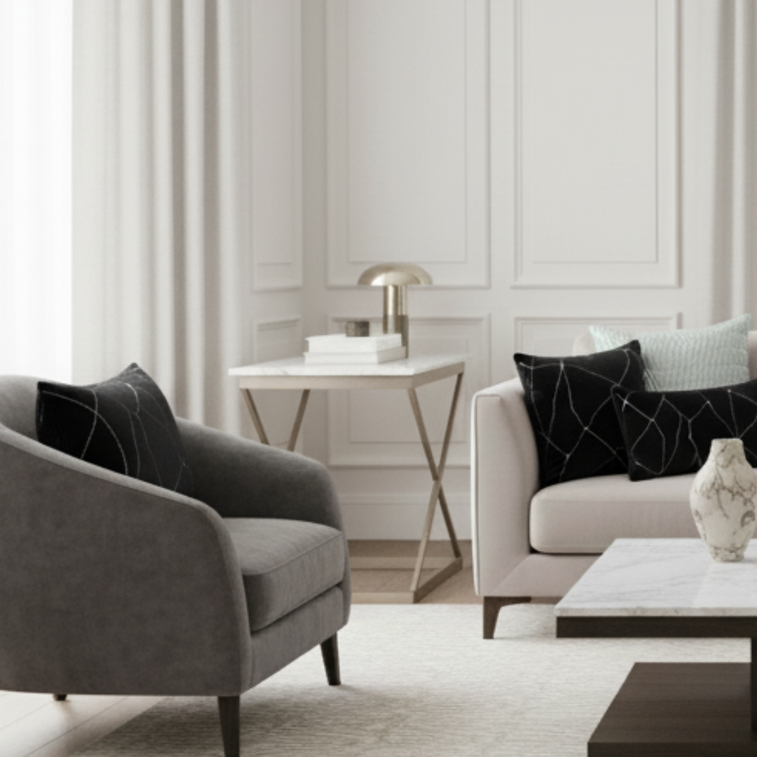 Modern living room with gray armchair, white sofa, and side table.