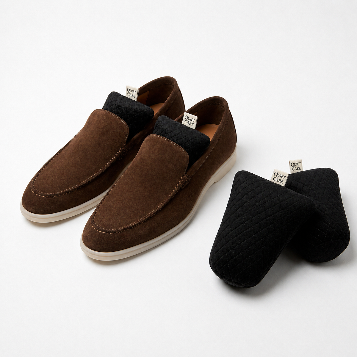 Quilted velvet shoe shapers in black with shoes, second styling angle