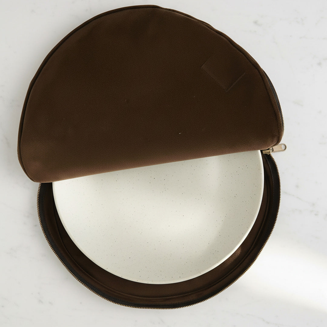 Brown leather case with a mirror on a white background