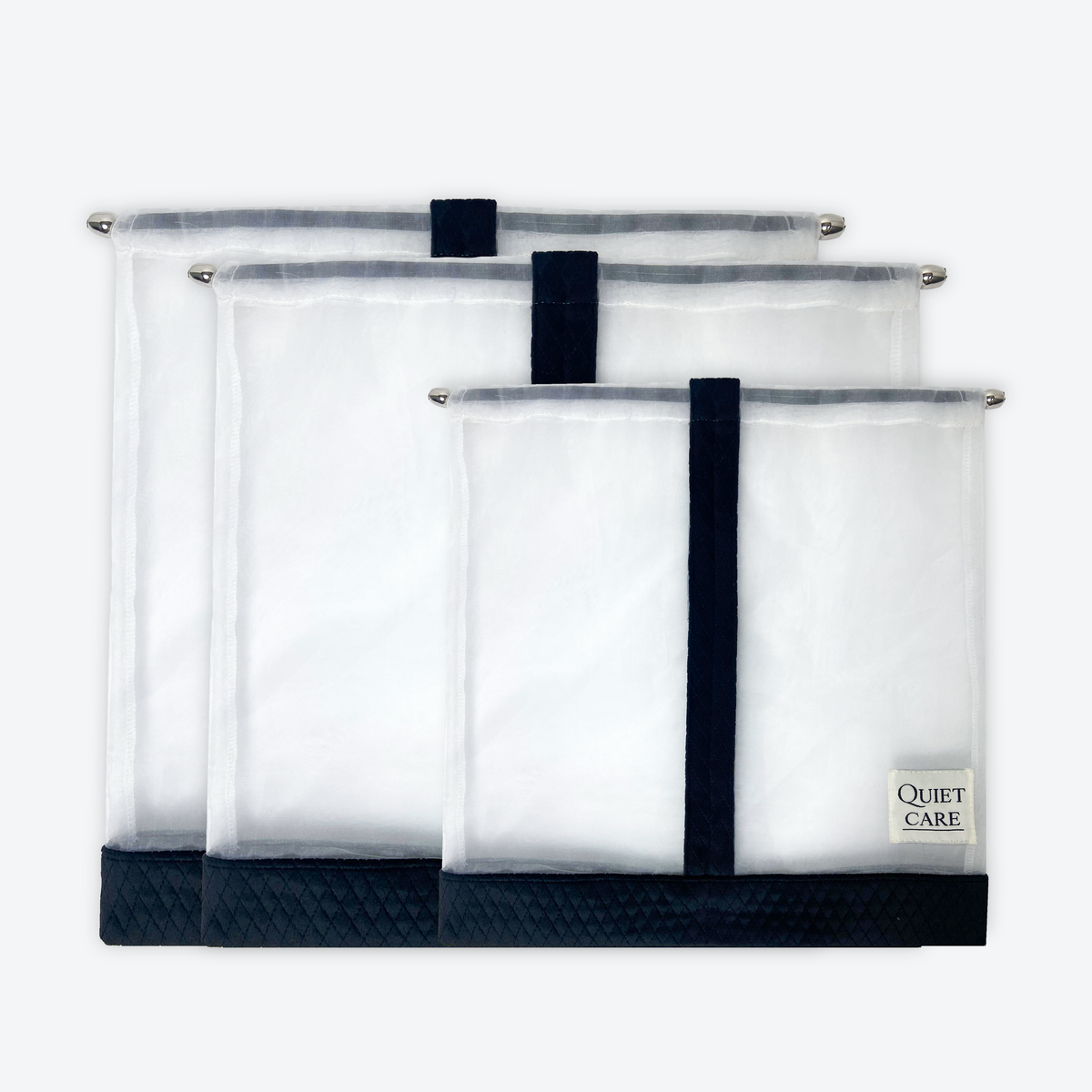 Sheer shoe bags with velvet trim in three sizes