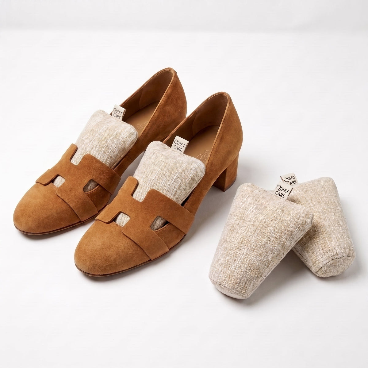 Linen blend shoe shapers in ecru shown beside shoes, for EU 35 to 39
