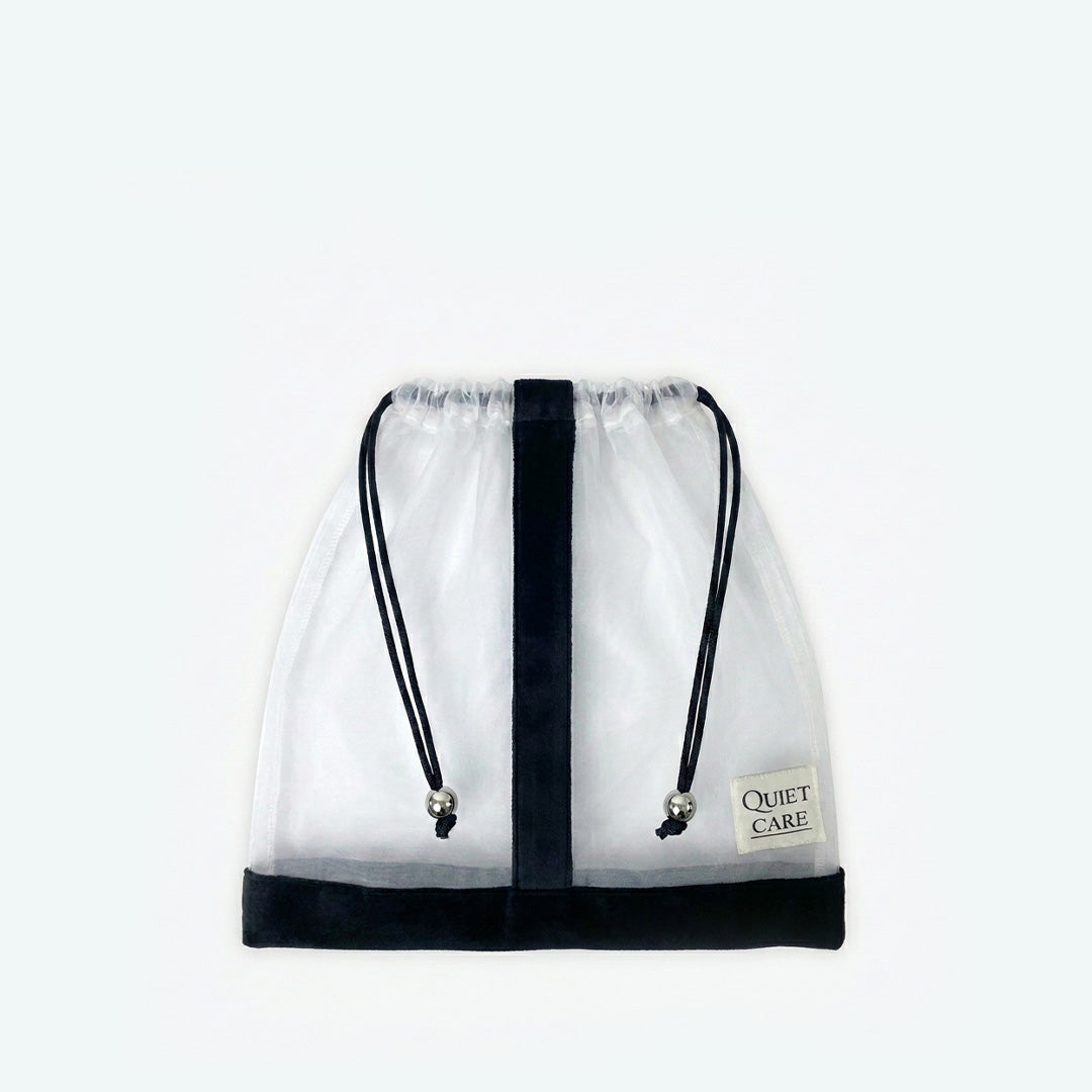 Sheer shoe bag with velvet trim and metal ball pulls, empty
