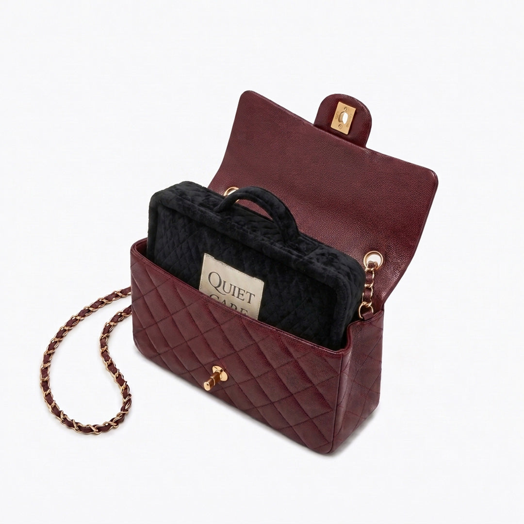 Quilted velvet bag shaper shown inside a small flap bag, holding the two faces apart