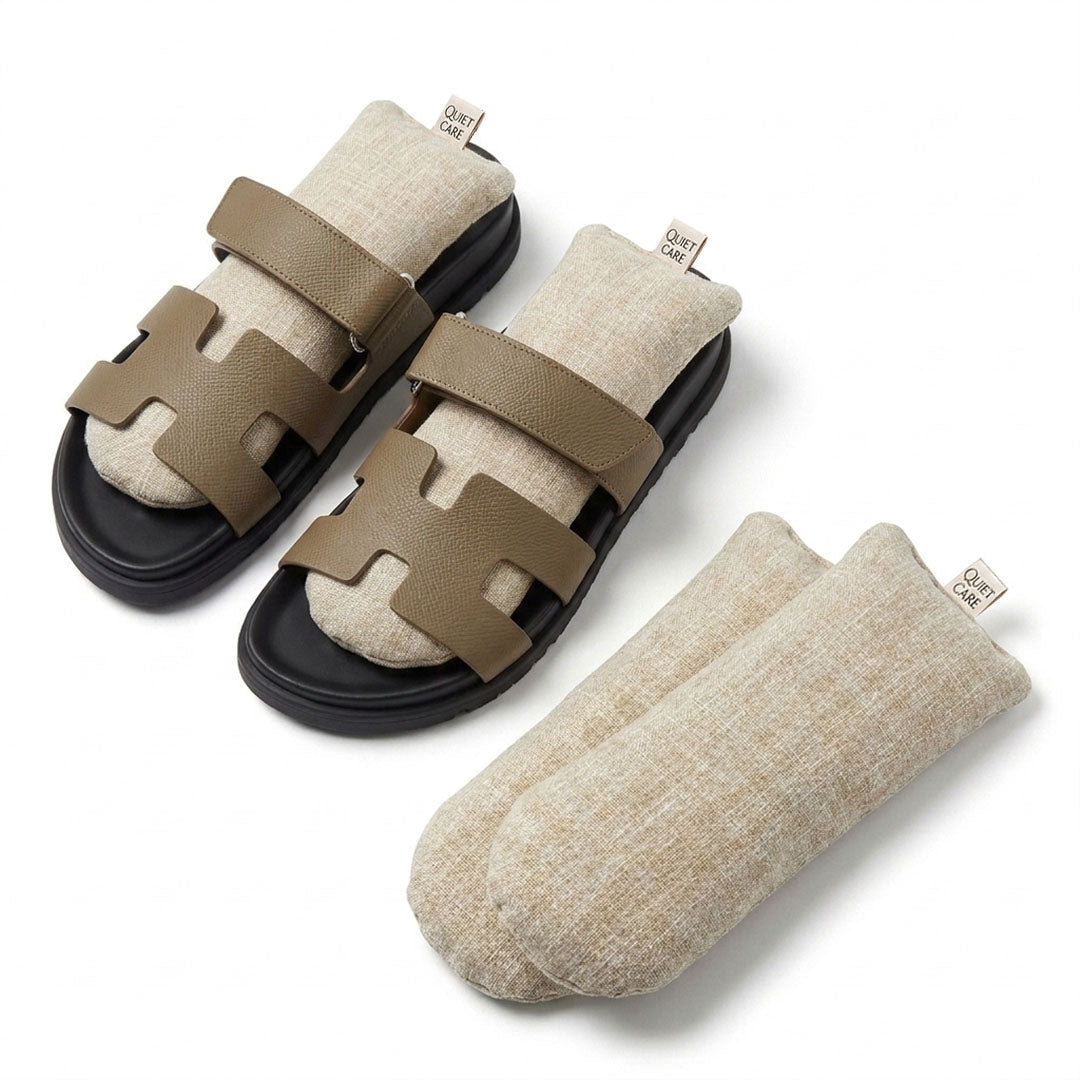 Full length linen blend shoe shapers in ecru shown beside shoes