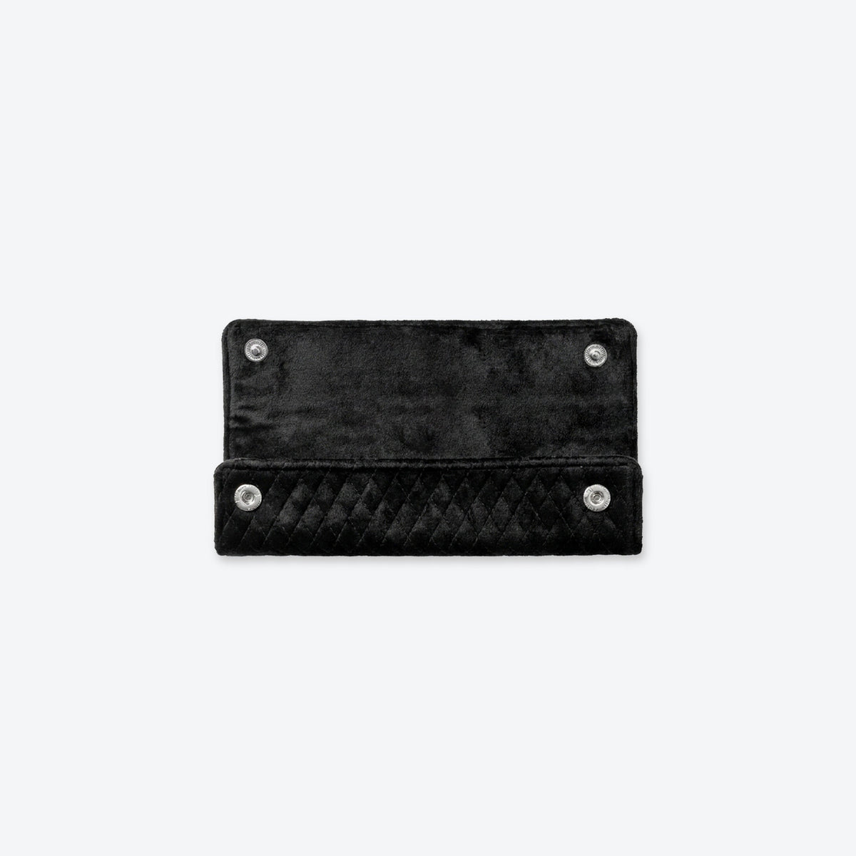Quilted velvet chain wrap in black, showing the quilting and closure detail