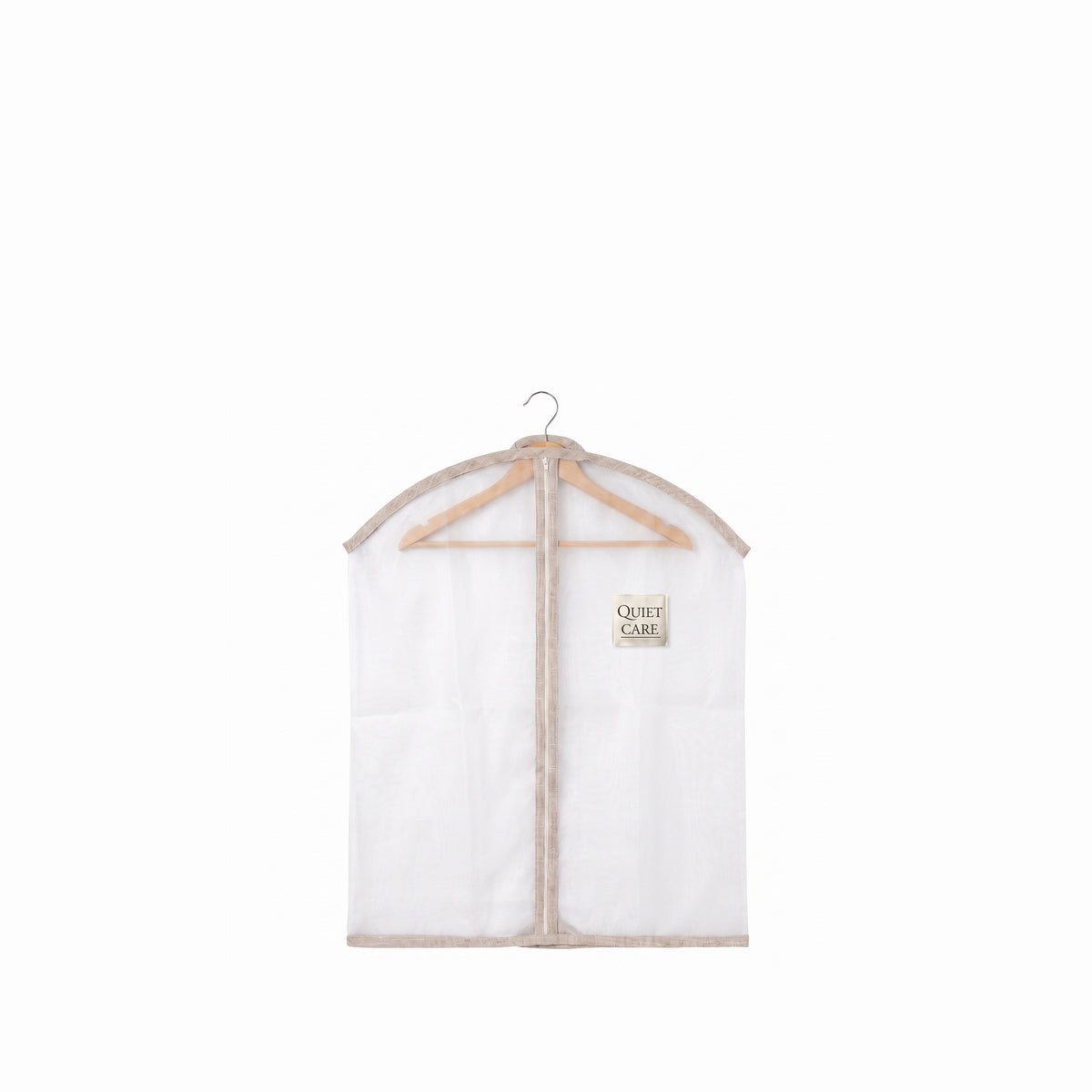 Sheer organza garment cover with linen blend trim in ecru, small, on a wooden hanger