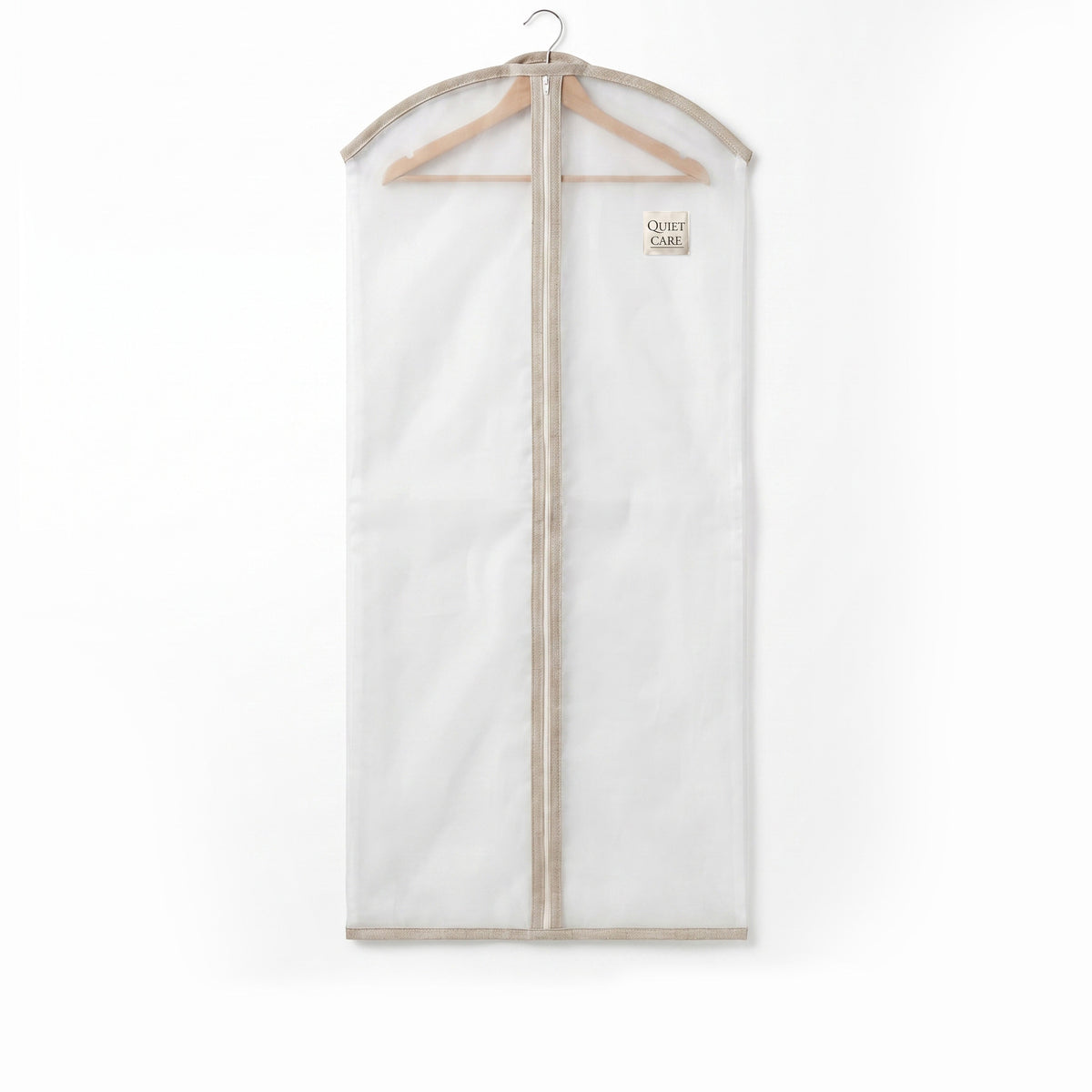 Sheer organza garment cover with linen blend trim in ecru, extra large, on a wooden hanger